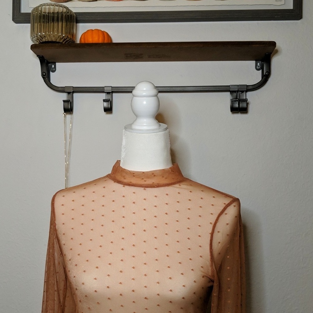 Long sleeve mesh bodysuit with dots. Brand new! Multiple sizes available.